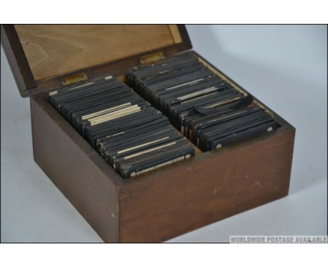 A collection of early 20th century magic lantern glass slides, mainly of topographical views