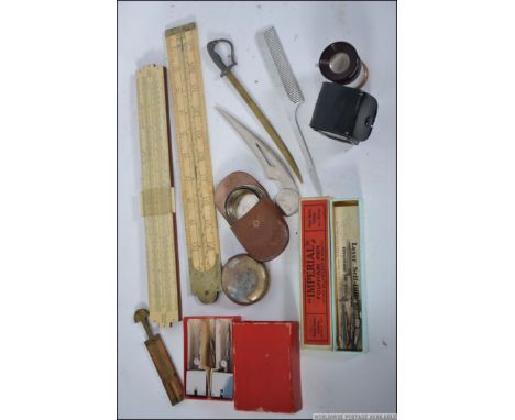 A collection of vintage measures to include bone with steel bracket, Unique Electrical Slide Rule, small wooden and brass mea