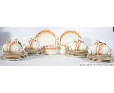 A quantity of vintage Royal Albert Crown China tea service to include cups, plates etc
