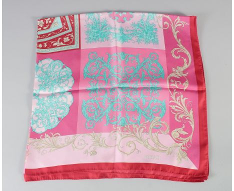A VERSACE PINK, RED AND BLUE SCARF. 180cm x 180cm.