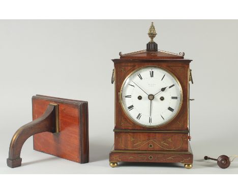 A GOOD REGENCY MAHOGANY BRASS INLAID BRACKET CLOCK by HOLMDEN, LONDON with enamel dial, strike/repeater and alarm anchor on a