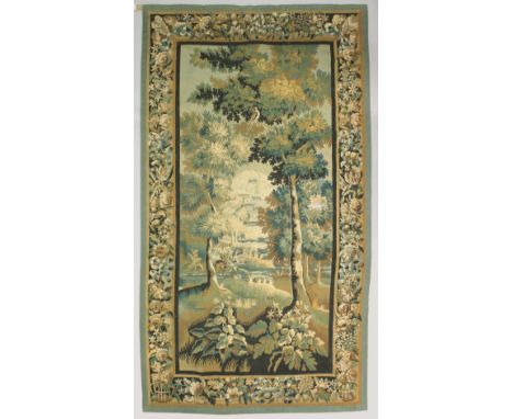 A LATE 19TH CENTURY CONTINENTAL TAPESTRY WALL HANGING depicting animals and birds in a woodland setting, a building in the di