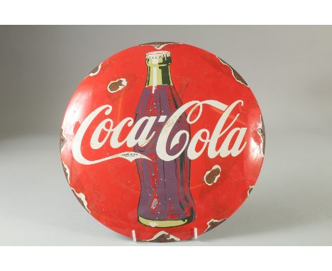 A CIRCULAR ENAMEL SIGN 'COCA COLA'.  11.5ins diameter.