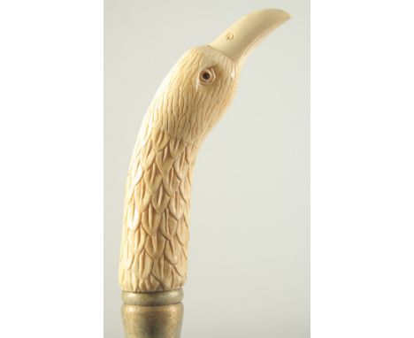 A WALKING STICK with carved bone handle, ' BIRD'.