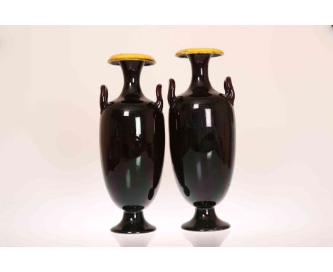 LINTHORPE POTTERY, NO. 2159 A PAIR OF TWO-HANDLED VASES, each with a deep purple glaze to the exterior and a yellow glaze to 