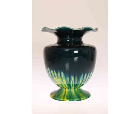 LINTHORPE POTTERY, NO. 1746A VASE OF SQUAT BALUSTER FORM, with broad undulating rim, blue drip glazed over mottled green and 