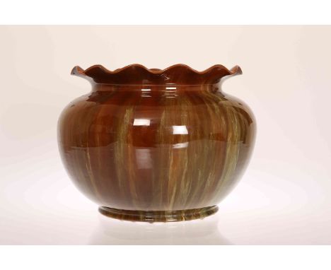 LINTHORPE POTTERY, NO. 1856 A JARDINIERE, with mottled brown glazed  body and wavy rim, impressed factory mark. 25cm high (da