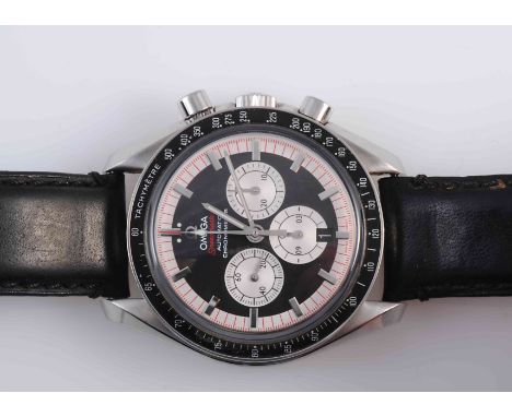 AN OMEGA STAINLESS STEEL SPEEDMASTER AUTOMATIC CHRONOMETER, THE LEGEND COLLECTION, MICHAEL SCHUMACHER, the black dial with th