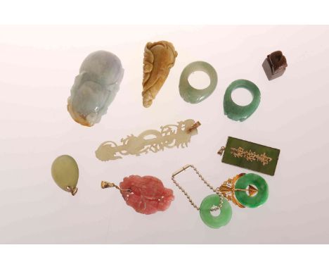 A SMALL COLLECTION OF CHINESE JEWELLERY AND OBJECTS, including a jadeite scroll weight, two rings, pendants, etc. (11)