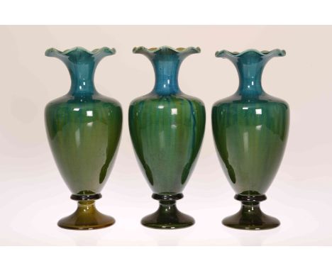 LINTHORPE POTTERY, NO. 2010 THREE VASES, of pedestal form with undulating rim, turquoise and green glazed, impressed marks. (