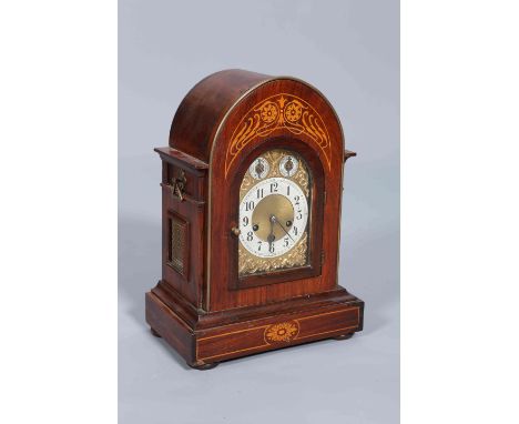 AN INLAID ROSEWOOD BRACKET CLOCK, CIRCA 1890, the case with arch top and Art Nouveau inlaid frieze above a brass arch dial wi