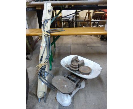 A set of Avery scales and a camp bed 
