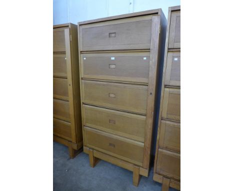 A Staverton Government issue light oak five door filing cabinet 