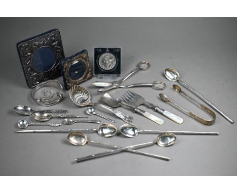 A Victorian pair of silver fiddle pattern sugar tongs, London 1894, various small silver spoons and five cocktail spoons/stra