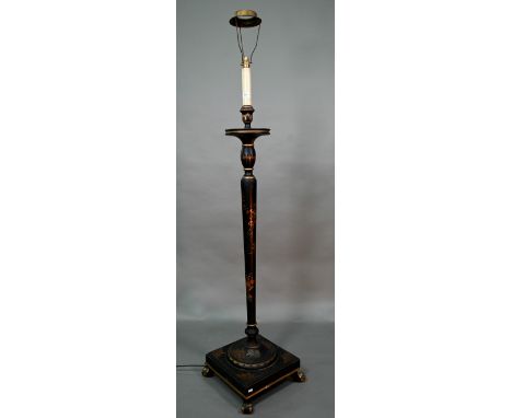 A Liberty style Japanned standard lamp, raised on a square base on scroll feet, early 20th century 