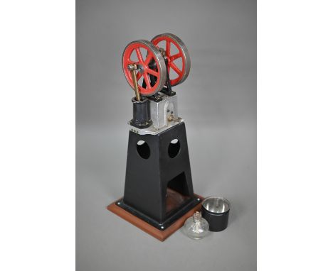 A steel and aluminium model Stirling engine with two fly-wheels, 55 cm high 