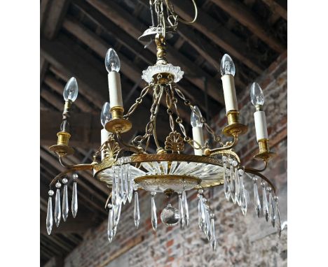 A vintage six-branch gilt framed chandelier, of oval form, crustal hung, suspended from link chain to a ceiling rose, ex-Foxl
