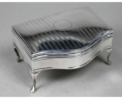 A silver serpentine-front ring box with fitted blue velvet lining, on cabriole supports, Martin, Hall &amp; Co. Ltd. Birmingh