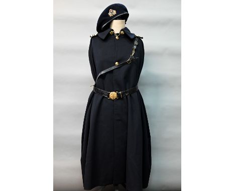 A Royal Navy boat cloak, beret and sword belt with King's crown on belt and&nbsp; Lt Cdr epaulettes, by Gieves 