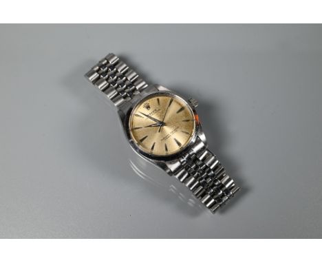 A Rolex Oyster Perpetual Chronometer gents wrist watch, model 6564, circa 1950's, stainless steel with champagne dial, ser. n