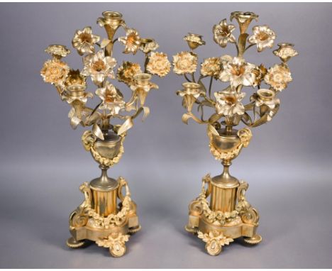 A pair of late 19th century gilt metal five light floral mantel candelabra, 50 cm h (2) 