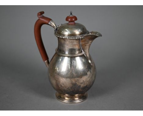 A silver pear-shaped chocolate pot with composite handle and finial, (makers' mark rubbed) Birmingham 1922, 11.5oz gross, 17c