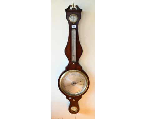 J Lione, London, a Victorian satinwood cased wheel barometer, with engraved silvered dial, thermometer scale, level indicator