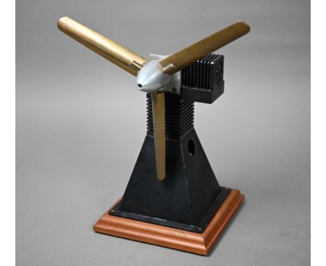 A small model Stirling engine, driving a propellor, 38cm high overall 