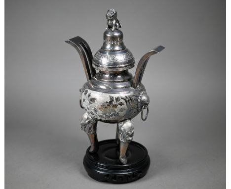 A Chinese Republic silver censer, the domed cover surmounted by kylin, the globular body with two large splayed handles above