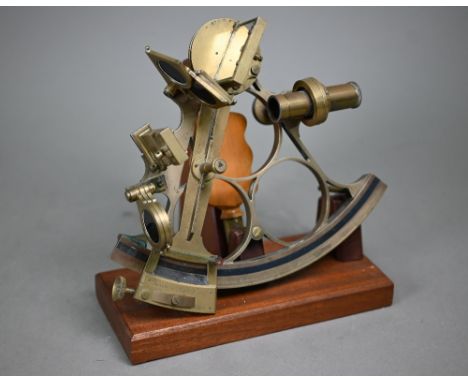 A vintage brass sextant by J Coombes, Devonport, named for Captain Kerrison Kiddle MBE RN 1876-1949 