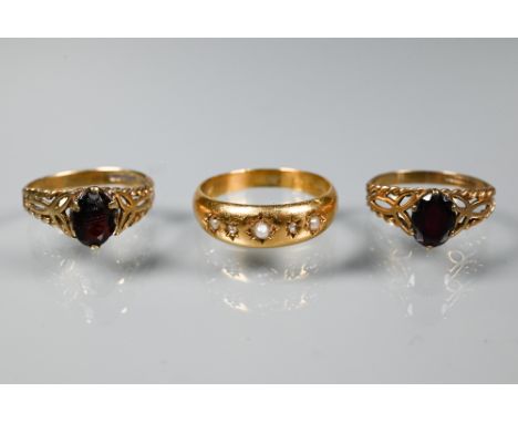 An antique 18ct yellow gold gypsy style ring set pearls and diamonds, size R, approx 2.5g to/w two garnet-set 9ct yellow gold