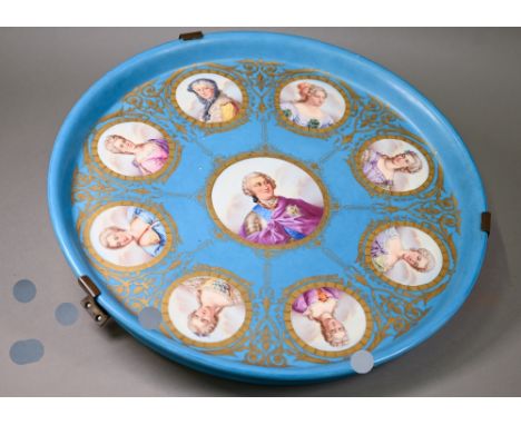 A 19th century Sevres porcelain large circular tray, painted with a portrait of Louis XV, encircled by portraits of eight of 