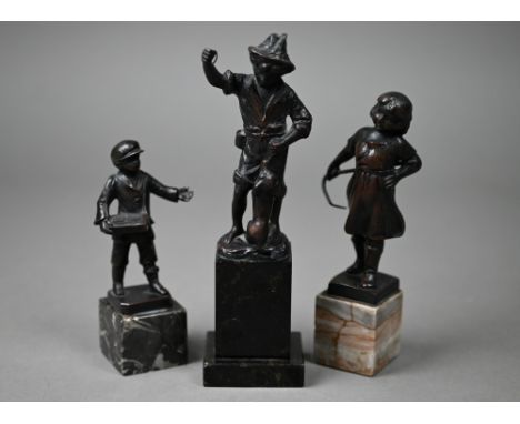 Three small bronze figures of children on marble bases, 17-11.5 cm&nbsp; 