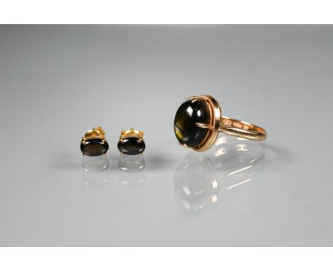 A contemporary dress ring set dark rutilated quartz cabochon, yellow metal stamped 12k, size N, to/w pair matching earrings f