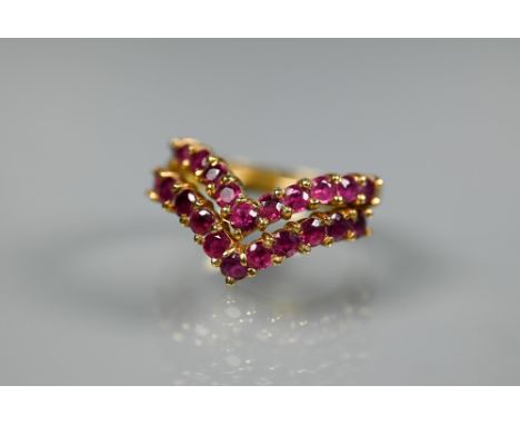 A pair of ruby set wishbone shape rings, 18ct yellow gold, size M (2) 