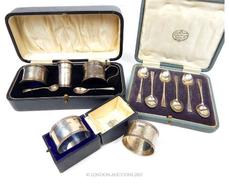 A collection of sterling silver items including a cased cruet set, Docker & Burn Ltd, Birmingham 1924, having blue glass line