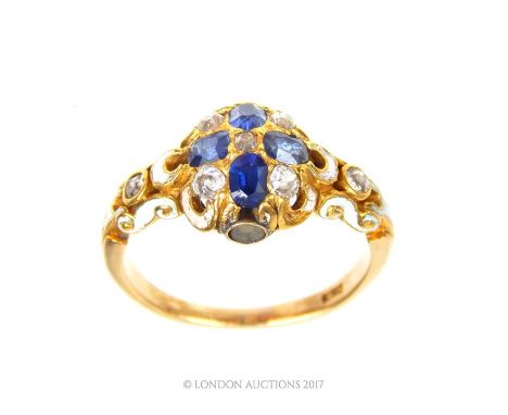 Attributed to Carlo Guiliano, white enamel, sapphire and diamond ring in a high ct yellow gold, centrally set with an old cut