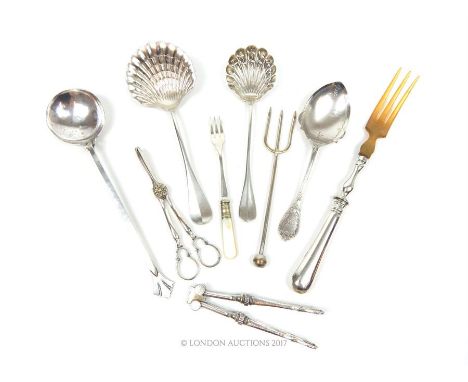 A mid 19th century French .950 standard solid silver sugar sifter, Henri-Louis Chenailler, 21cm long, together with a Contine