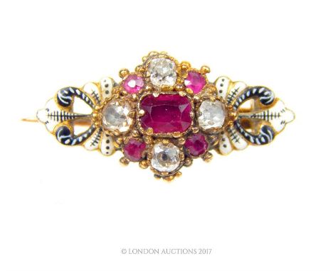 An antique, Carlo Giuliano, ruby, diamond and enamel brooch composed of a central mount centrally set with a rectangular, fac