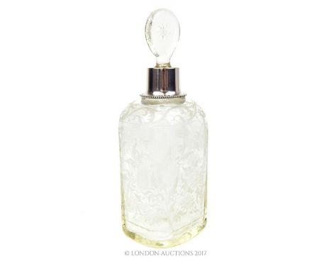 A Continental glass decanter with a silver collar, the stopper of teardrop form, engraved with a star, the collar marked 'CEI