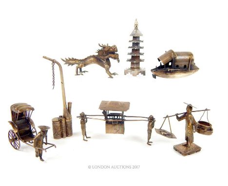 A collection of late 19th and early 20th century Chinese miniature silver items, most bearing the mark of Wang Hing & Co of H