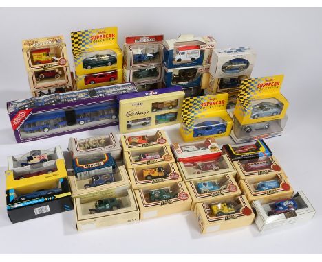 Collection of Lledo Days Gone, Corgi and other model cars and vehicles, all housed in original boxes (qty)