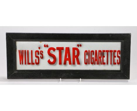 Wills's "Star" cigarettes enamel sign, the red lettering on a background, housed in a black pained frame, 46.5cm x 17.5cm