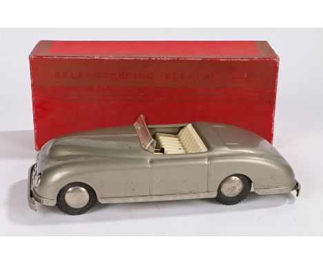Tin plate Harold Flory Products battery operated 'Self-Steering Electric Car', in the form of a model roadster car with silve
