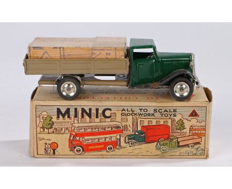 Minic, Lorry with cases, with a green chassis and light brown back, wooden blocks to the back still wrapped, boxed