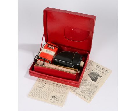 Eagle Minicine Projector, boxed with the Eagle films Dan Dare, Battle in Space and P.C.49 in a case of Kidnap