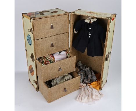 Doll's travel trunk, the trunk opening to reveal four interior drawers and hanging rail, the drawers containing dolls outfits