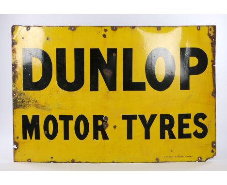 Dunlop enamel sign, the yellow ground with black lettering "Dunlop Motor Tyres", 183cm x 122cm