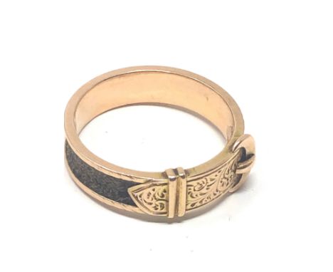 Fine Antique 18ct gold buckle mourning ring the ring has bucle front set with a band of plaited hair around the name has been