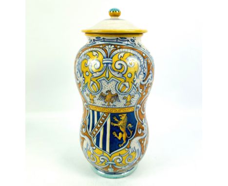 A large Italian Renaissance Albarello pottery jar and cover decorated with a coat of arms, signed to the base, 15cms wide x 3